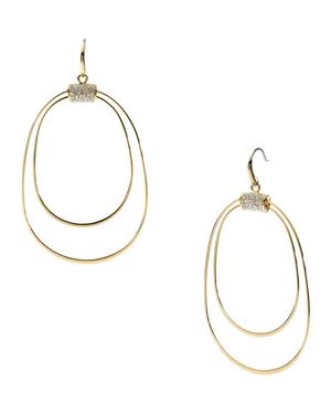 Thin oval earrings with rhinestones